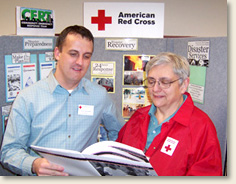 American Red Cross Greater Rochester NY Chapter Emergency Services Director Leighton Jones and CERT Team & Volunteer Leader Pam Hatch review disaster education options as they plan for the ongoing Red Cross training for the CERT team.